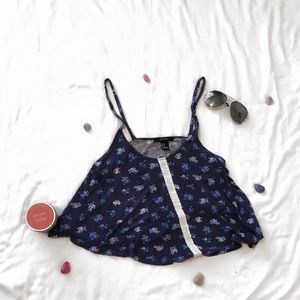 Blue flowered crop top curvy hemline